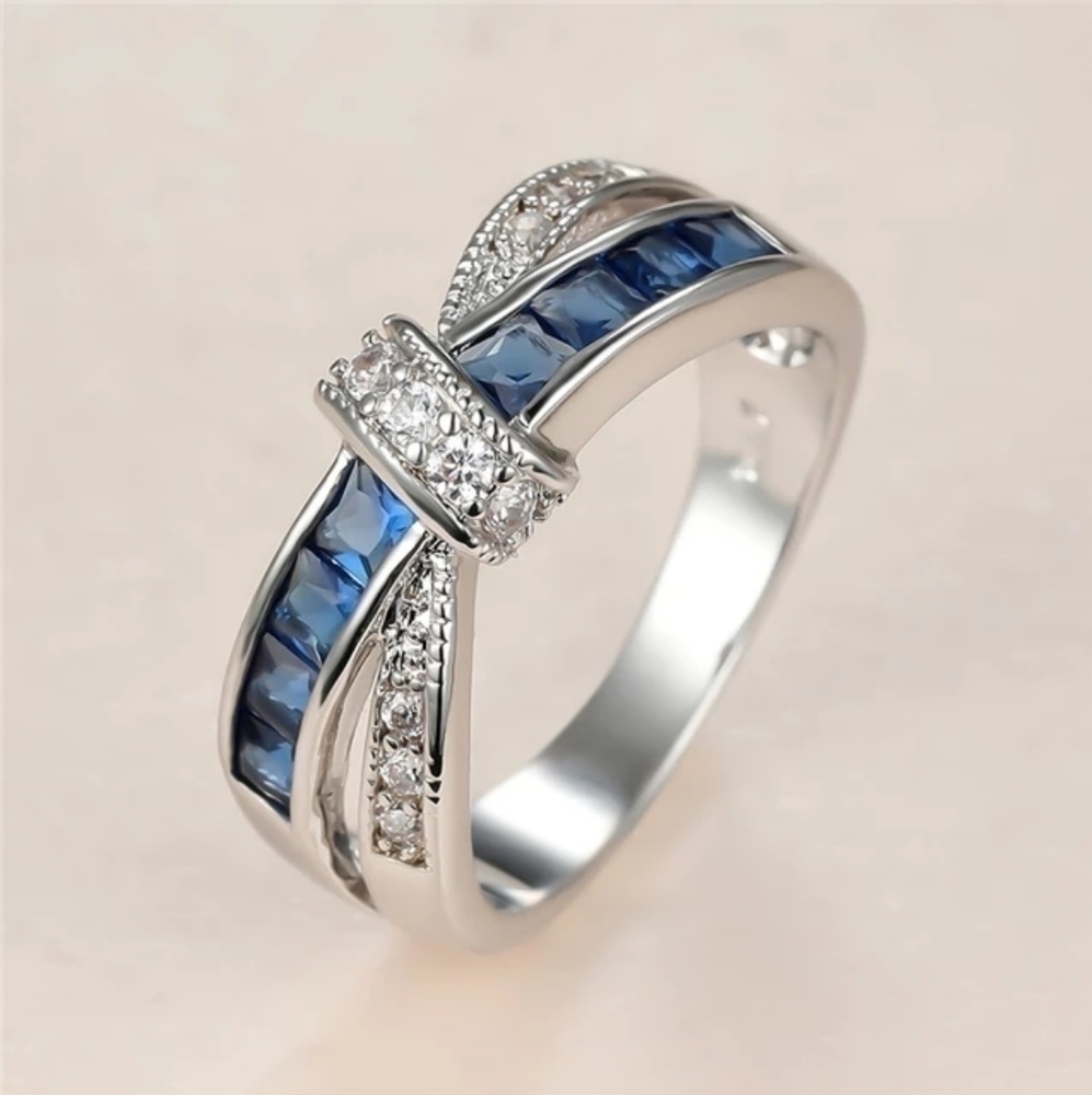 Blue Sapphire Criss Cross 10k White Gold Plated Bow Ring